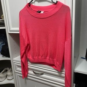 Divided pink sweater